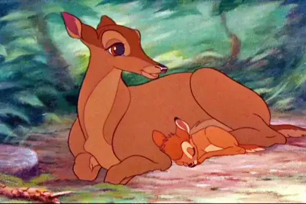 Animated scene of a mother deer and her fawn resting in a forest setting.
