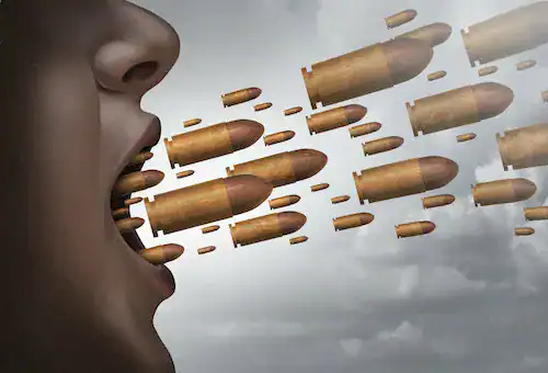 Person's mouth with bullets flying out, symbolizing intense speech or conflict.