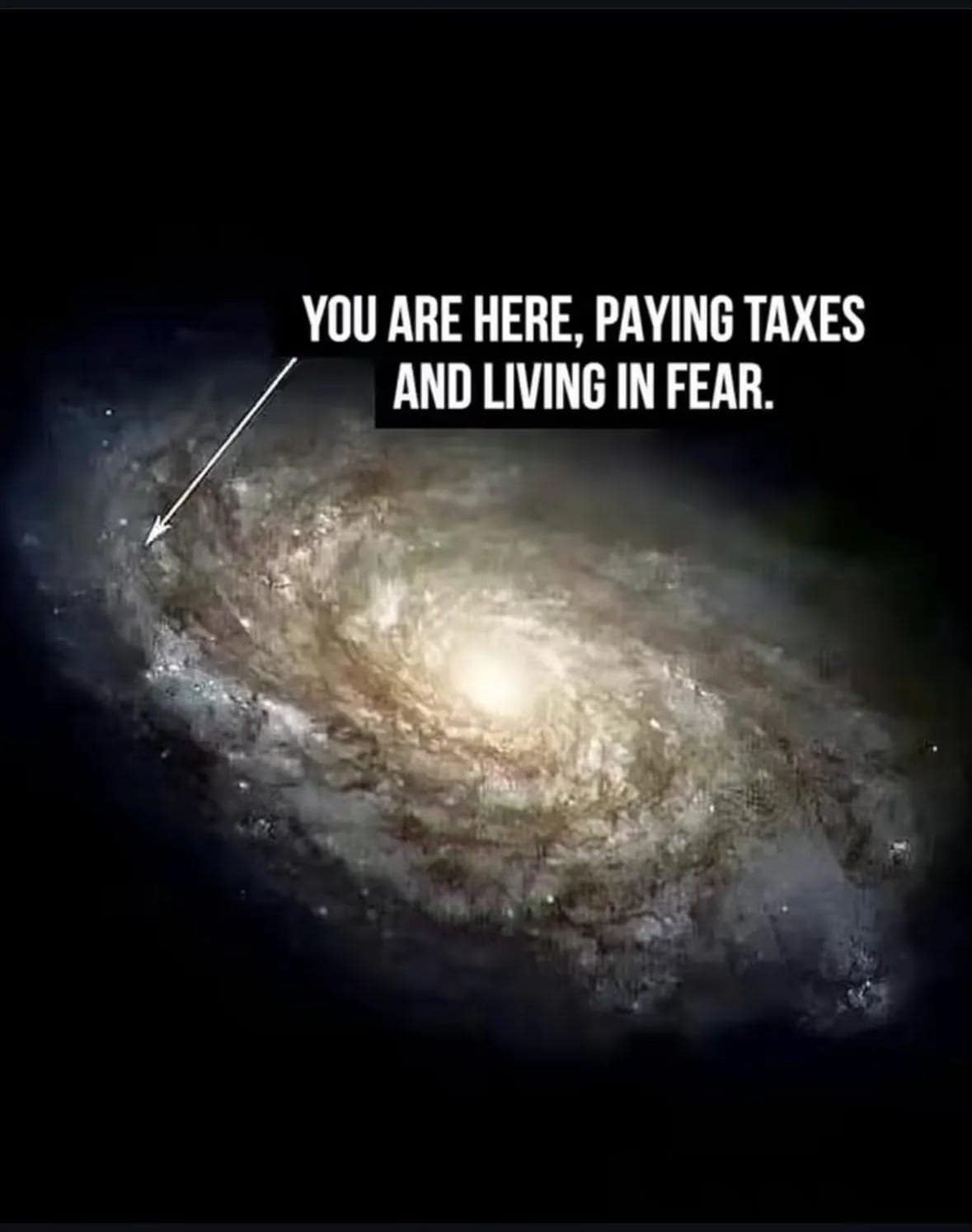 Galaxy image with overlay text about paying taxes and living in fear.